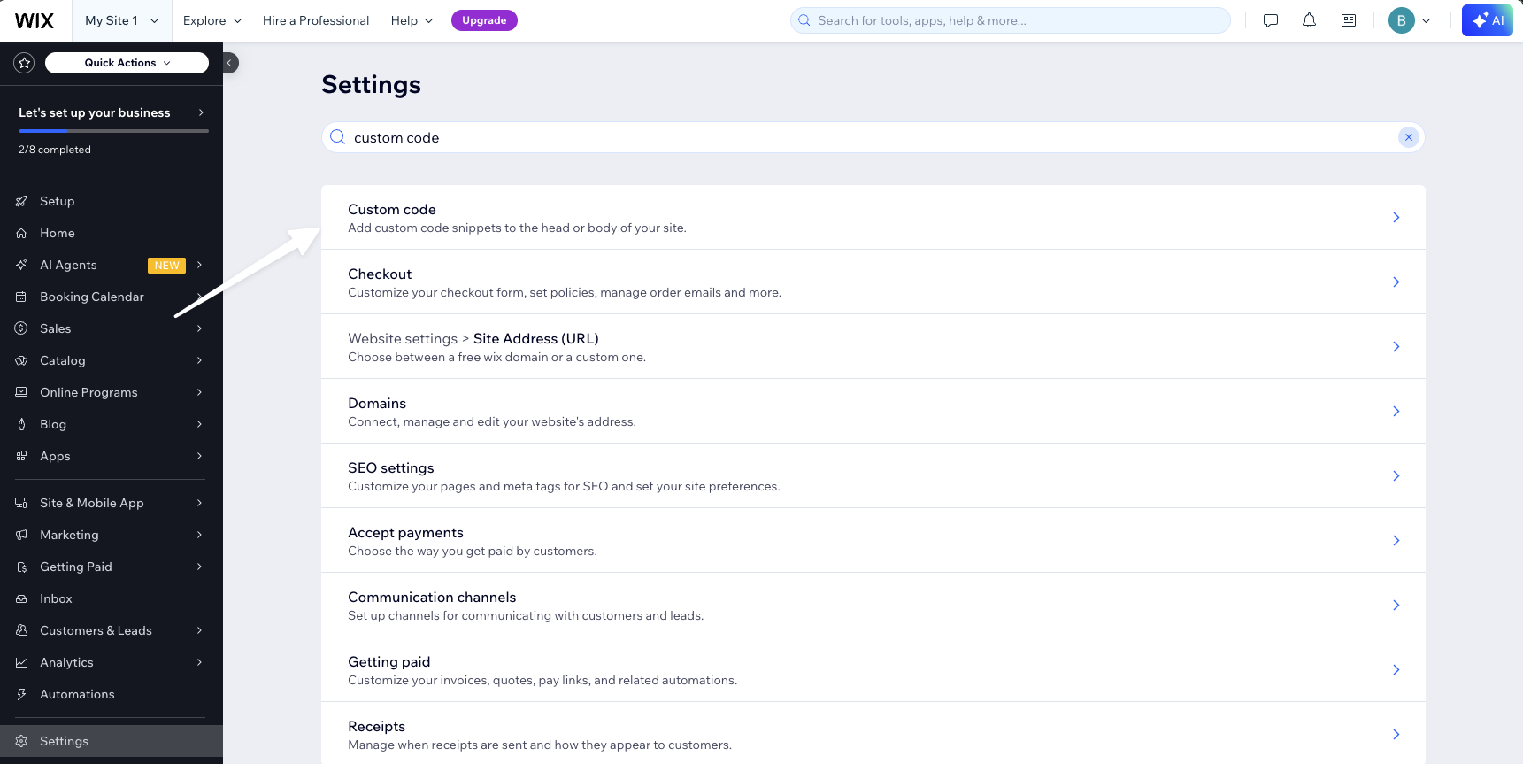 Wix Settings search showing the Custom code result